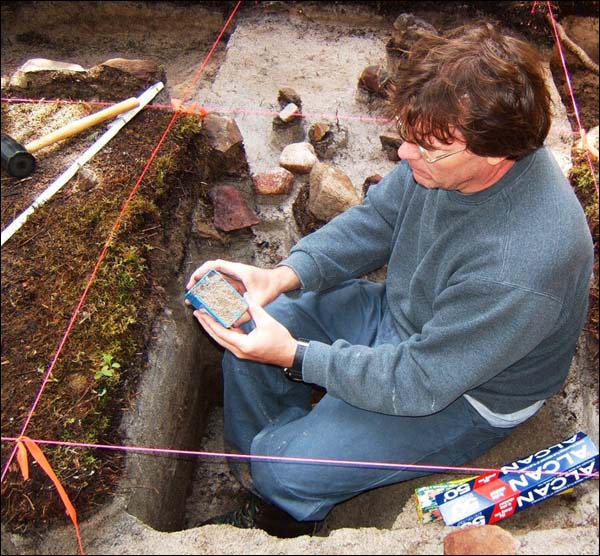 Dr. Richard Josephs collecting a sample at the Ferguson Bay 1 site, Ashuanipi Lake.